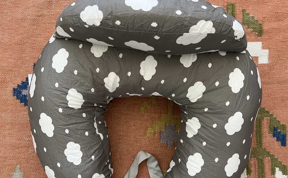 Momcozy nursing pillow photographed from above.