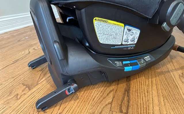 The base of the Nuna Pipa Aire Rx showing two integrated rigid LATCH connectors extending from it. The base, infant carrier and LATCH connectors are all black.