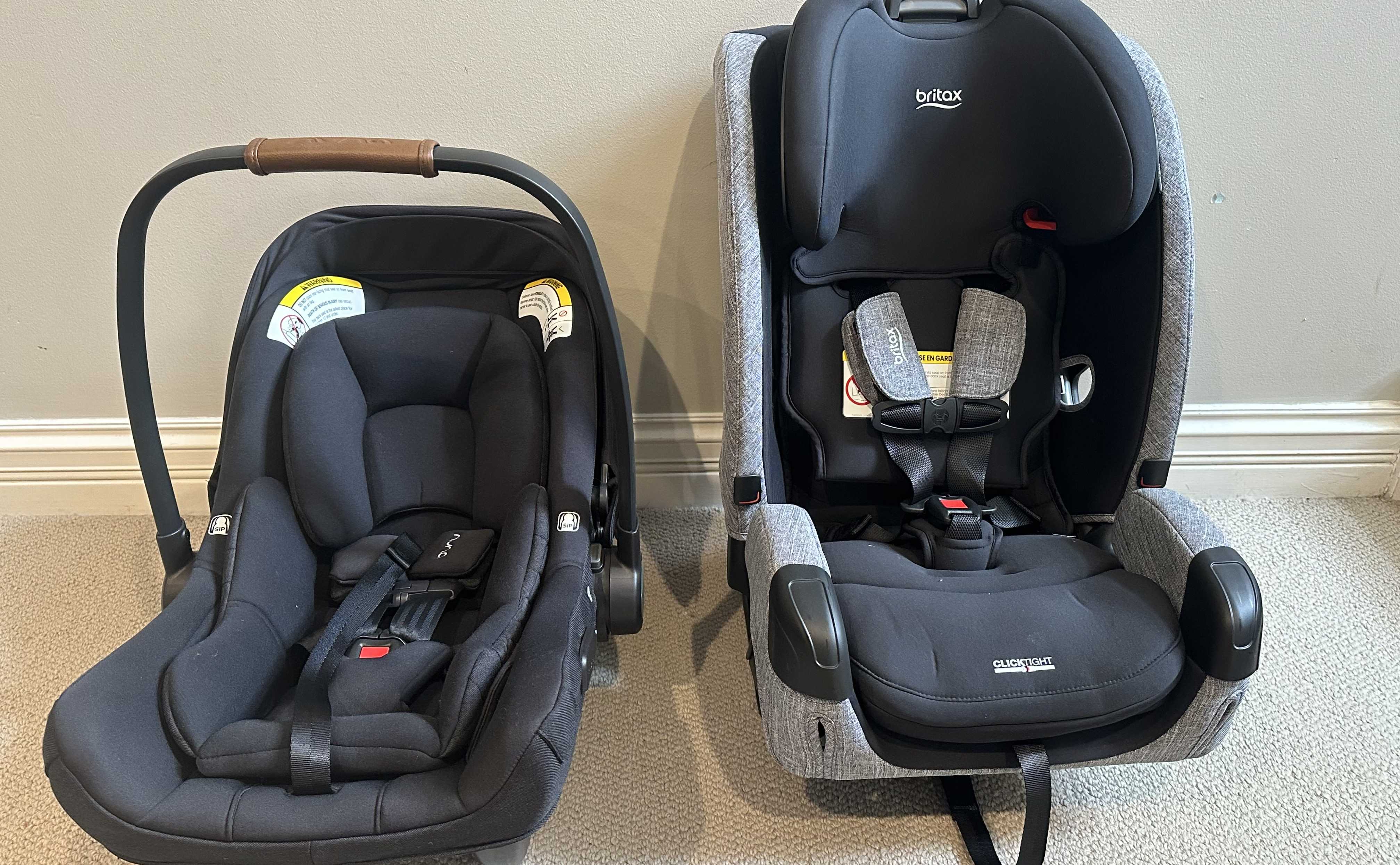 An infant car seat (Nuna Pipa aire rx) pictured next to a convertible car seat (Britax Poplar Slim).