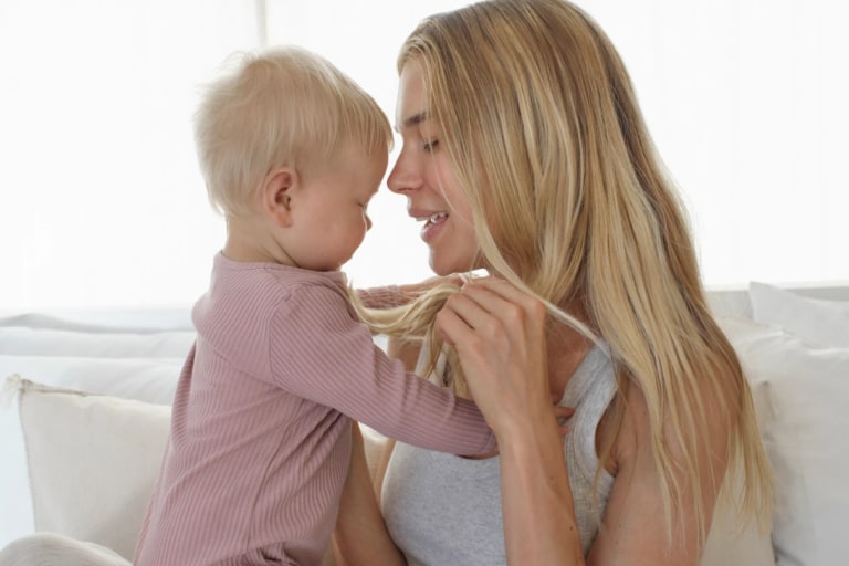 5 Moms Share How They Navigated Postpartum Hair Thinning and Shedding.