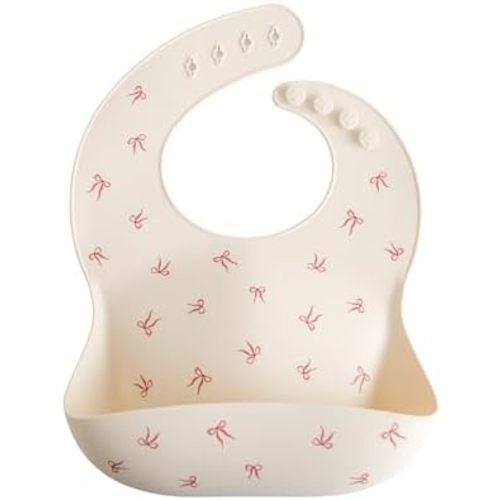 mushie Silicone Baby Bib | Adjustable Fit Waterproof Bibs (Bows)