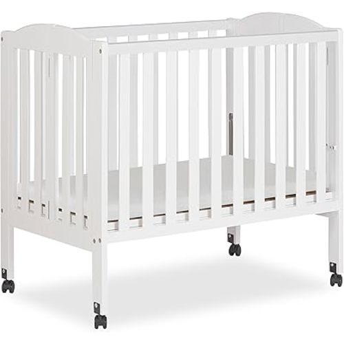 Dream On Me 2-in-1 Folding Portable Compact Mini Baby Crib in White, GreenGuard Gold & JPMA, US Patented Flat Folding System, Locking Wheels, 1″ Mattress Pad, Space-Saving Quck Fold Easy Storage