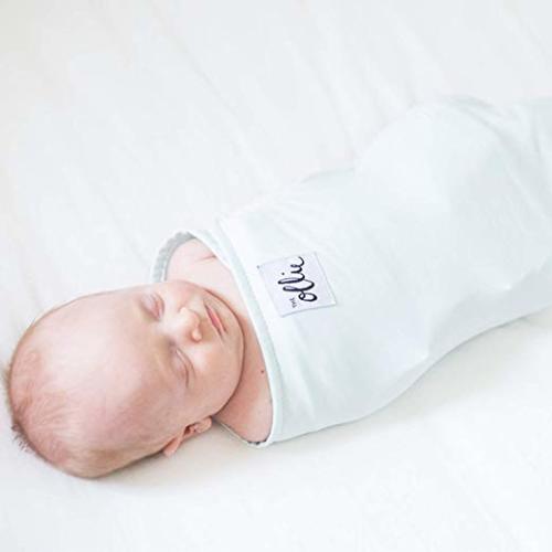 The Ollie Swaddle (Sky) - Helps to Reduce The Moro (Startle) Reflex - Made from a Custom Designed Moisture-Wicking Material-No overheating-Size Adjustable for All Months of Babies