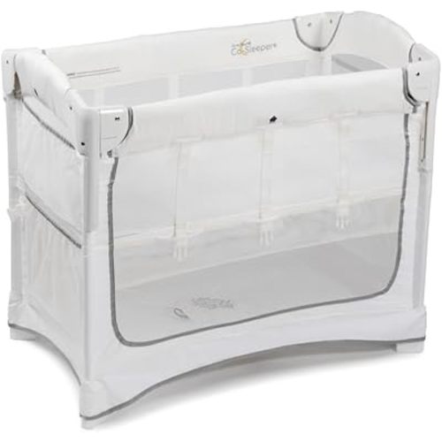 Arm’s Reach Mini Ezee 2 in 1 Co-Sleeper Bedside Bassinet Featuring Breathable Mesh Side Panels with 2 Wheels for Portability, Side Pockets, and Bottom Storage, White