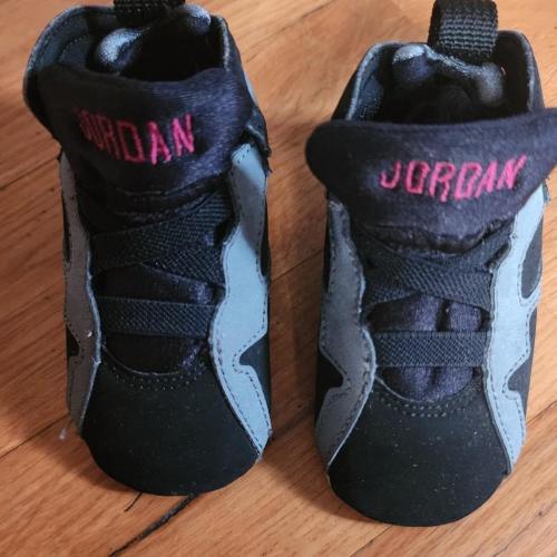 Jordan baby sneakers in black, gray, and pink with...