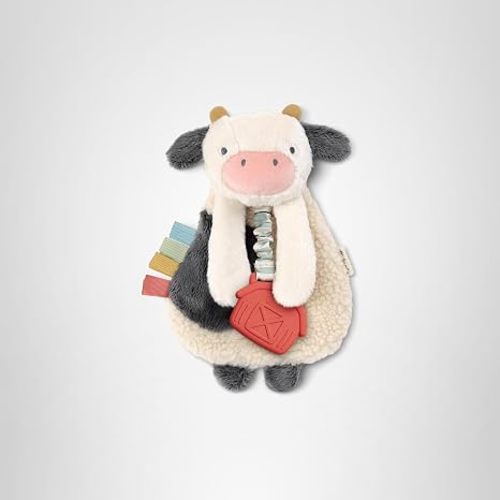 Itzy Ritzy - Itzy Lovey Including Teether - Baby Lovey with Teether, Textured Ribbons & Dangle Arms - Features Crinkle Sound, Sherpa Fabric and Minky Plush (Cow)