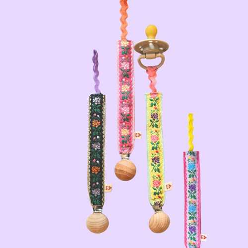 Pacifier chain made from traditional braid