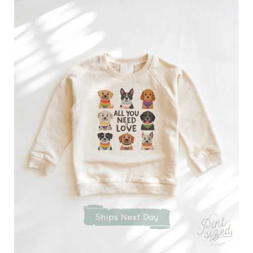 All You Need Is Love Baby Onesie® - LGBTQ+ Rainbow Bodysuit - Cute Dog Pride Month Natural Onesie®