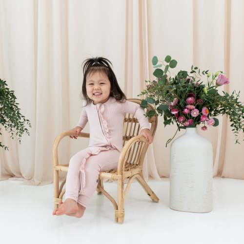Ribbed Ruffle Bamboo Zipper Romper in Blush | Kyte Baby