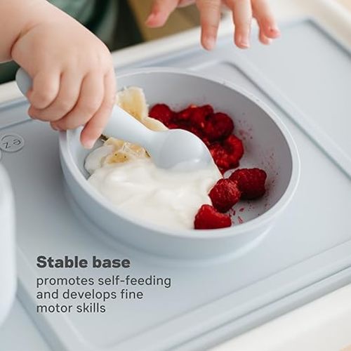 ezpz Mini Bowl for 12 Months+ (Indigo) - 100% Silicone Suction Bowl with Built-in Placemat for Toddlers - Comes with a Reusable Travel Bag