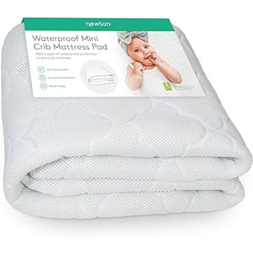 Newton Baby Waterproof MINI Crib Mattress Pad | Ultra-Breathable Quilted Layer for Comfort & Universal Fitted Skirt for Secure Fit | Machine Washable | MINI Crib Mattress Protector Pad, 1 Pack