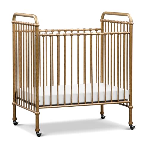 NAMESAKE Abigail 3-in-1 Portable Baby Crib with Wheels - GREENGUARD Gold Certified Convertible Crib to Toddler Bed & Daybed - Metal Baby Bed w/ 4 Adjustable Mattress Heights, for Small Spaces - Gold