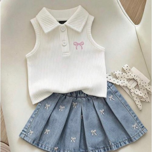 Vintaside Kids Baby Girls' Short Sleeve Sleeveless Set, Ivory Top + Light Blue Denim Skirt. The Top Is A Sleeveless, Stretchy Polo Collar Knit Design With A Pink Bow Embroidery On The Chest. The Skirt Is A Light Wash Denim Short Skirt With White Embroider