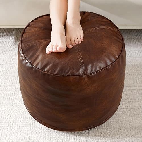 HIGOGOGO Round Stuffed Pouf Ottoman, Pu Leather Poufs with Foam Chunk Filling, Furry and Fluffy Pouf Foot Stool Storage Ottoman, 26 X 18 Floor Poufs Foot Rest for Living Room,Dark Brown