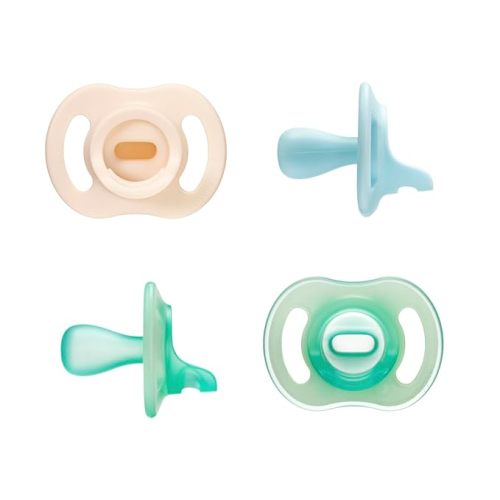 Tommee Tippee Stay Put Pacifier Set, Contains 2 Ultra-Light StayPut Glow in The Dark Pacifiers and 2 Ultra-Light StayPut Pacifiers, 0-6 Months, Colors May Vary, One-Piece Silicone Design, Pack of 4