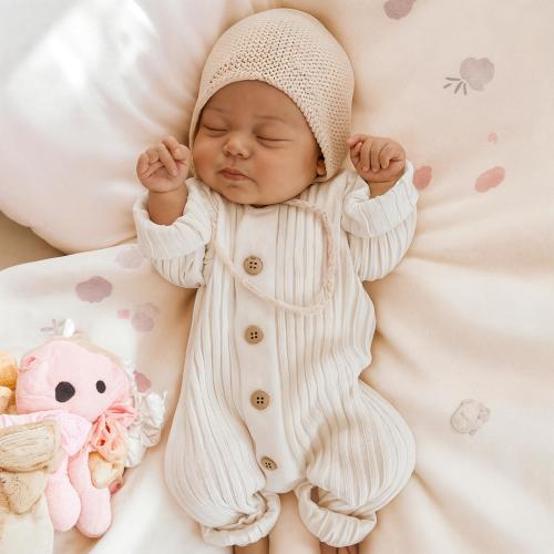 Cotton Knit Baby Romper: Soft Ribbed Infant Outfit with Wooden Buttons