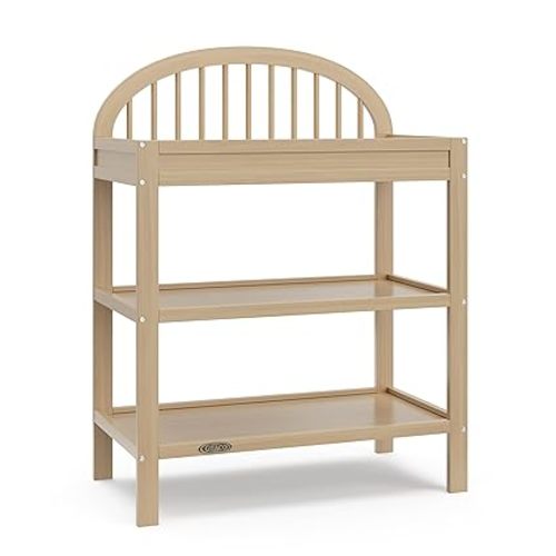 Graco Olivia Changing Table with Water-Resistant Changing Pad (Driftwood) - GREENGUARD Gold Certified, Includes Bonus Water-Resistant Changing Pad with Safety Strap, 2 Open Shelves, Stylish Design