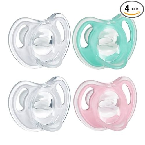 Tommee Tippee Ultra-Light Silicone Pacifier, 0-6 Months, Symmetrical One-Piece Design, BPA-Free Silicone Binkies, Clear/Green/Pink, Pack of 4