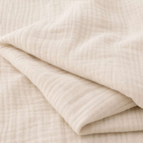 Newton Baby Set of 2 Compact Travel Crib and Play Yard Sandstone Beige Sheets