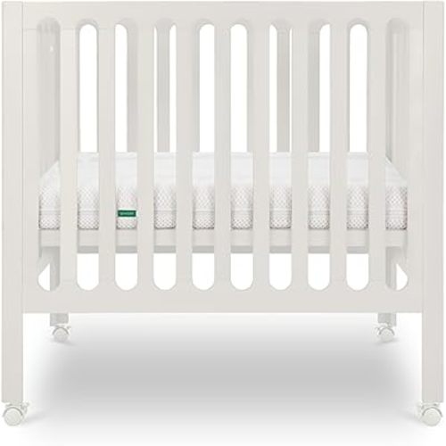 Newton Baby Galileo Mini Crib Solid Beech Wood with Wheels in Warm White, Mini Crib Mattress Included, Adjustable Mattress Height, Ultra-Safe Non-Toxic Finish