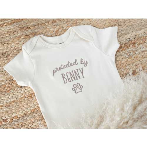 Embroidered Protected By Dog Baby Onesie®: Personalized Newborn Gift for Pregnancy Announcement