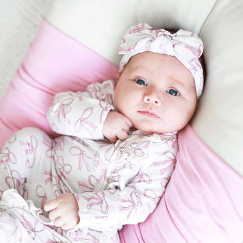 Blushing Bows Ruffle Zipper Footie
