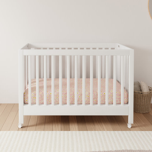 babyletto Maki Portable Folding Crib with Toddler Bed Conversion Kit - White
