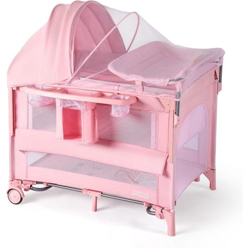 JOYMOR 9 in 1 Bedside Bassinet with Changing Table, Pack and Play with Bassinet, Convert to Rocking Baby Bed with Electric Music Center, Mosquito Net, Storage,Pink