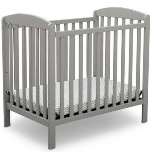 Delta Children Sprout Mini Crib With Adjustable Height and Mattress