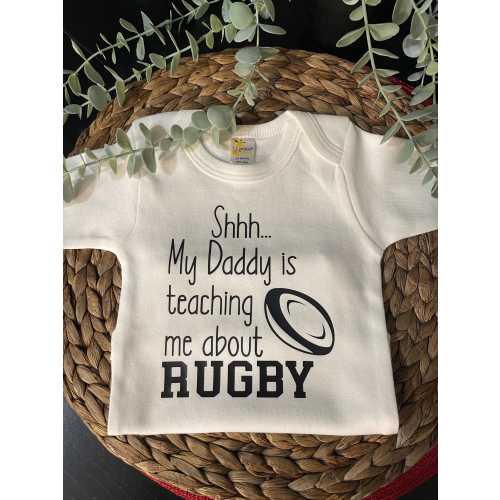 Shh...… My Daddy is Teaching Me About Rugby Baby Onesie