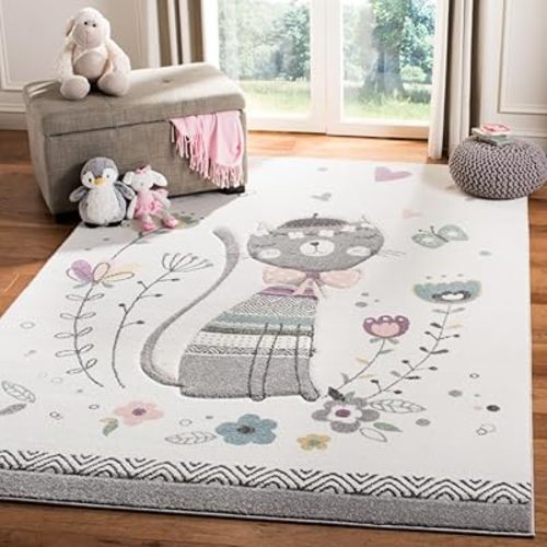 SAFAVIEH Carousel Kids Collection Area Rug - 6'7" x 9', Ivory & Pink, Cat Design, Non-Shedding & Easy Care, Ideal for High Traffic Areas for Boys & Girls in Playroom, Nursery, Bedroom (CRK187A)