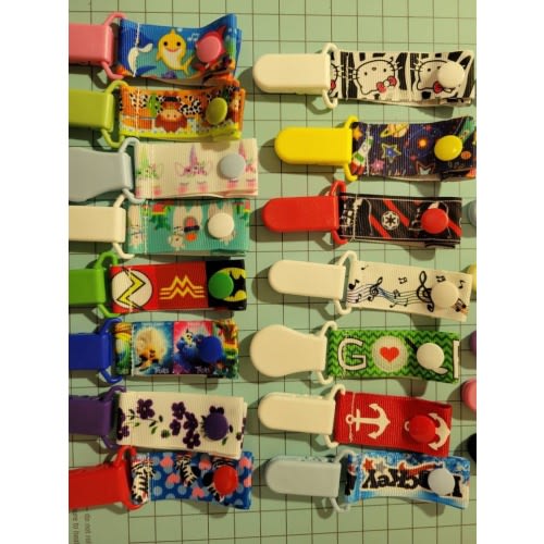 20 For 22.00 Tubie Clips, extension covers, gtube pads, mix & match. You pick your prints, all the same or mixture.  Big selection.