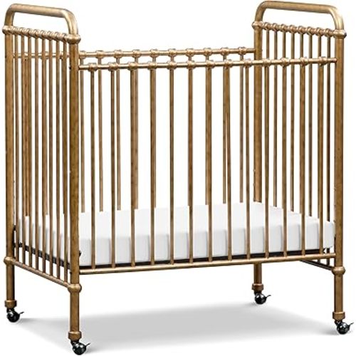 NAMESAKE Abigail 3-in-1 Portable Baby Crib with Wheels - GREENGUARD Gold Certified Convertible Crib to Toddler Bed & Daybed - Metal Baby Bed w/ 4 Adjustable Mattress Heights, for Small Spaces - Gold