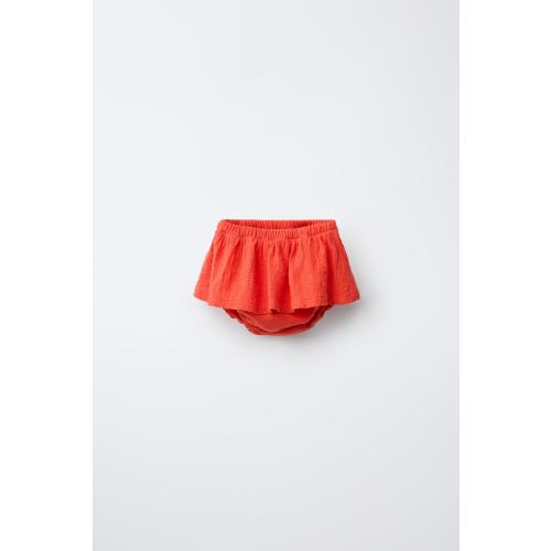 Size 6-9 months SKIRTED BOTTOMS - Red