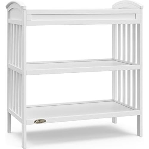 Graco Benton Changing Table with Bonus Water-Resistant Changing Pad (White) - GREENGUARD Gold Certified, Includes Diaper Change Pad with Safety Strap, 2 Open Storage Shelves for Organizing