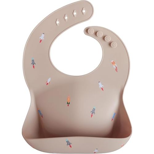 mushie Silicone Baby Bib | Adjustable Fit Waterproof Bibs (Rocket Ship)