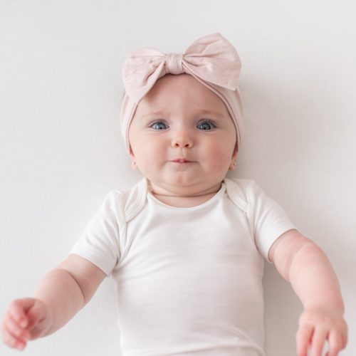 Bow Headband in Blush - Kyte Baby Bamboo Baby Clothes, Sleep Bags & Essentials