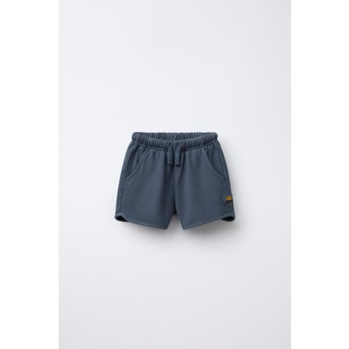 STRAIGHT GARMENT DYE LABEL PLUSH SHORTS - Navy blue | ZARA United States