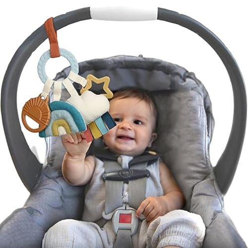 Itzy Ritzy Teething Activity Toy - Bitzy Busy Ring Infant Teething Toy Features Braided Ring & Dangling Toys, Includes Teether, Textured Ribbons, Crinkle Sound & Jingle Bell - 0 Months & Up (Rainbow)