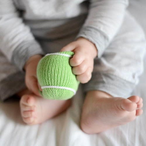 Shop Organic Tennis Ball Rattle Baby Toy | Estella