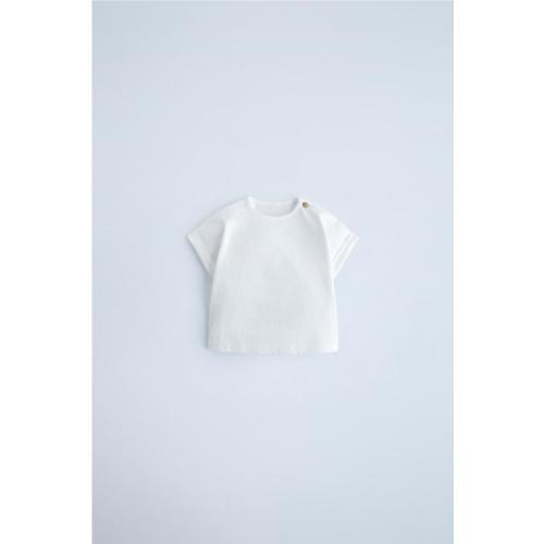 DRAWSTRING SHORTSBUTTON TANK TOPDRAWSTRING SHORTS