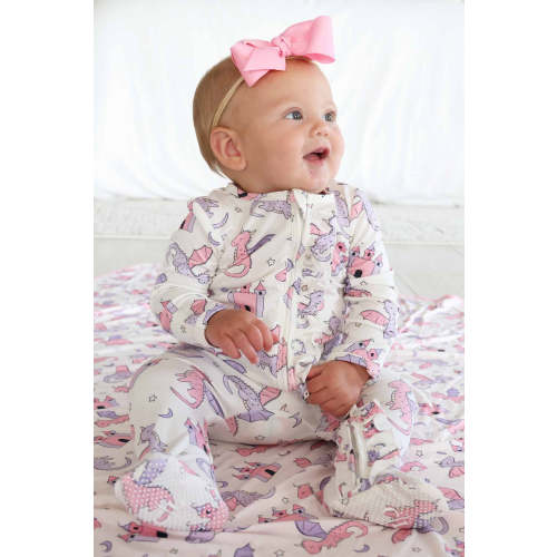 Dragon Adventure Ruffle Zipper Footie in Pink | Caden Lane