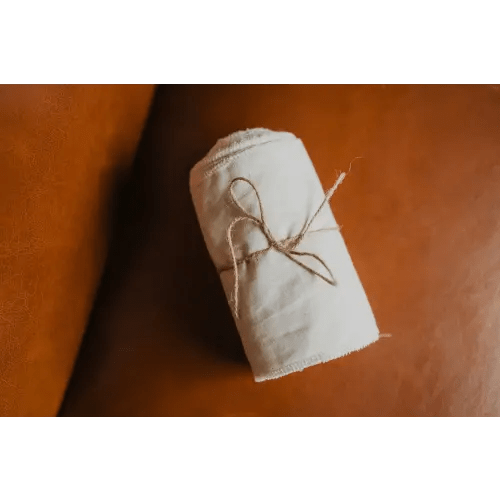 100% organic cotton muslin wrap with serged ends for Bengkung belly binding during postpartum. — Resolute Birth