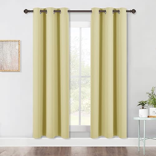 NICETOWN Bedroom Blackout Draperies Panels, 2 Panels, 42 x 72 Inch, Paler Yellow, Three Pass Microfiber Noise Reducing Thermal Insulated Solid Ring Top Window Curtains