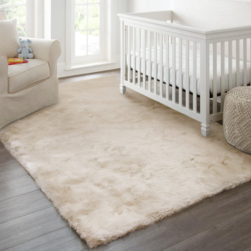 Mercer41 Tristion Cozy Faux Rabbit Fur Area Rug Machine Washable Rug in Beige