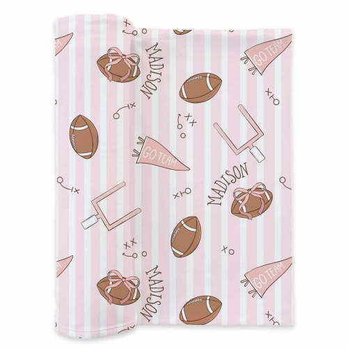Tiny Touchdowns Personalized Swaddle Blanket in Pink | Caden Lane