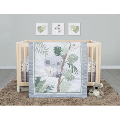 Reversible 4 - Piece Crib Bedding Set