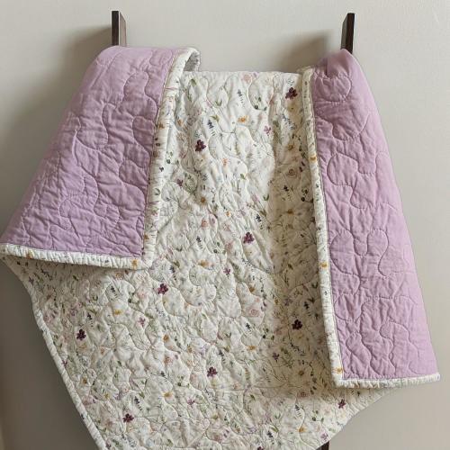 Whimsical Floral Baby Quilt – Crib Size | 100% Cotton | Lavender Backing | Handmade Nursery Blanket