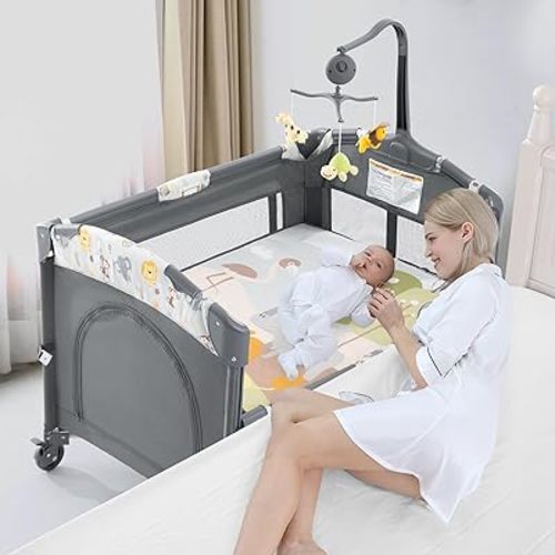 Jaoul 5 in 1 Baby Crib, Bassinet Beside Sleeper, Pack and Play with Bassinet and Changing Table Portable Travel Baby Playpen with Toys & Music Box, Mattress for Girl Boy Infant Newborn