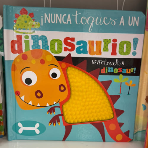 ¡Nunca Toques a un Dinosaurio! / Never Touch a Dinosaur! (Spanish and English Edition)